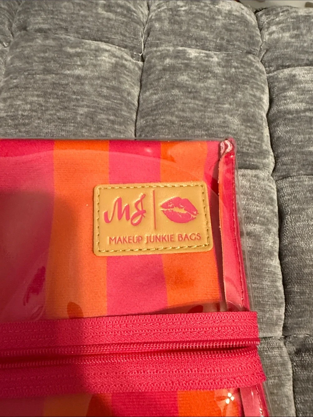 Makeup Junkie Striped Pink & Orange Vinyl Clutch with Tassel